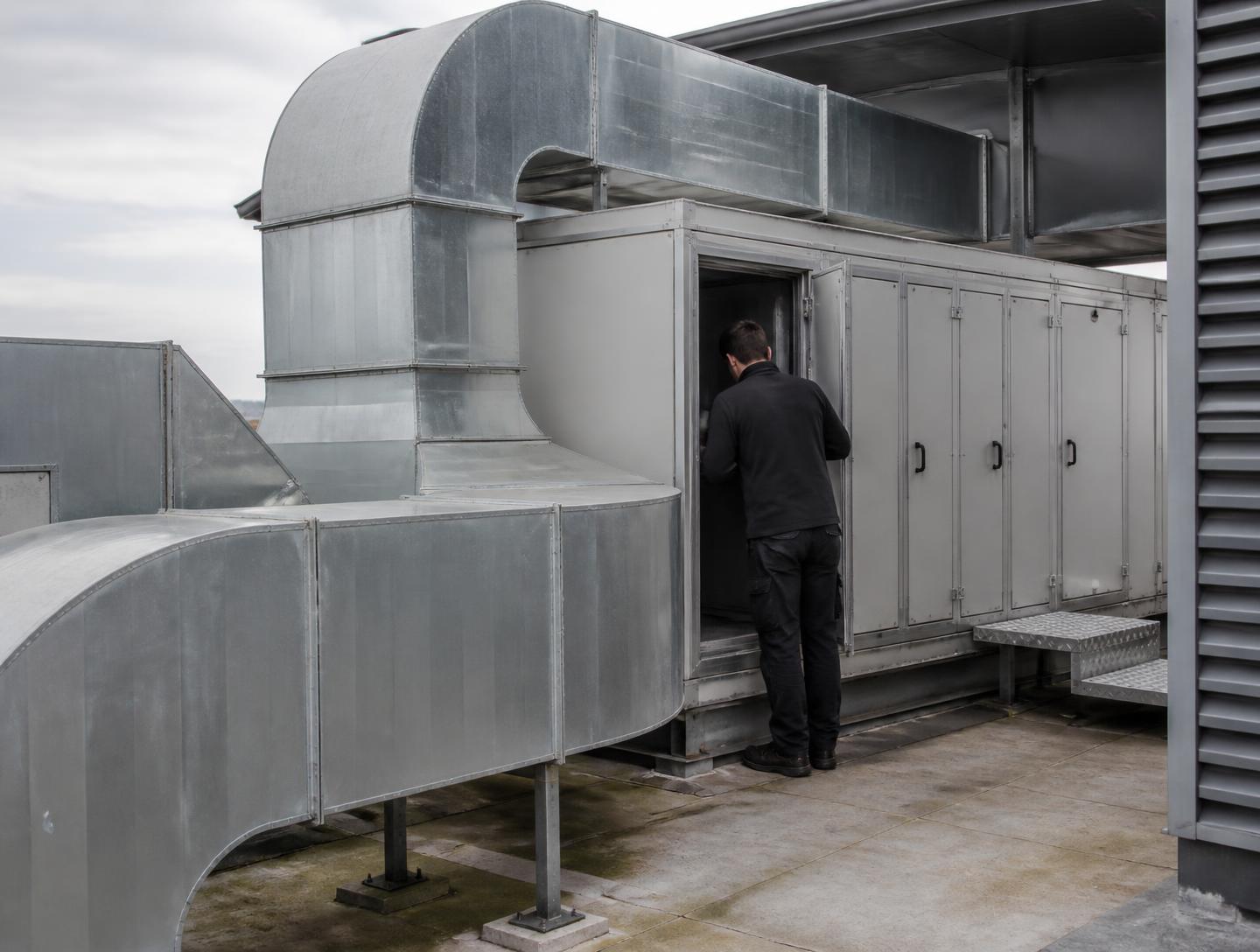 Rooftop air handling unit and galvanised ductwork on a commercial building
